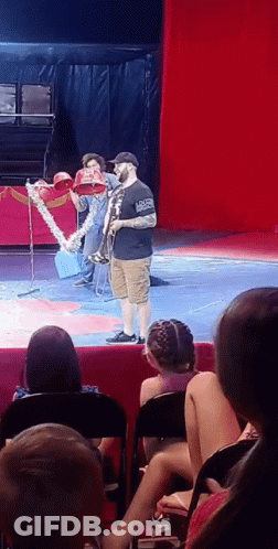 Man Playing Saxophone On Stage GIF