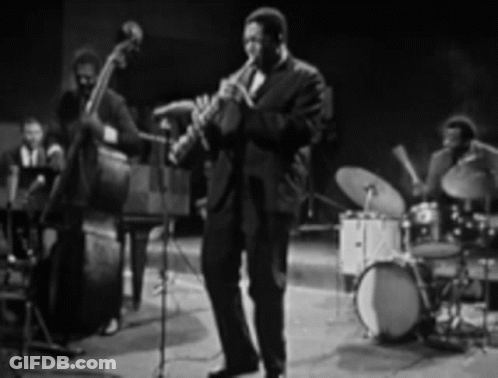 Man Playing Saxophone On Stage GIF