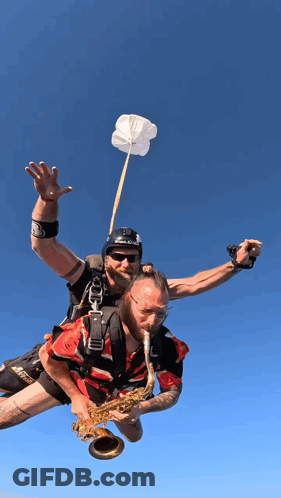 Man Playing Saxophone With Parachute GIF