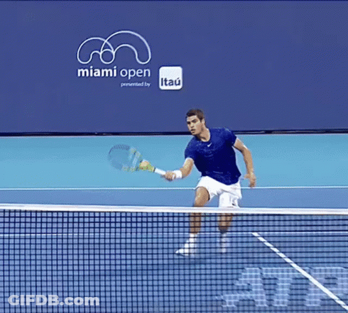 Man Playing Tennis At Miami Open Banner GIF