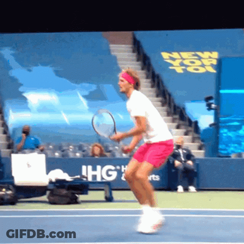Man Playing Tennis At New York Sign GIF