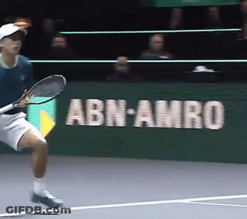 Man Playing Tennis In Front Of ABN AMRO Sign GIF