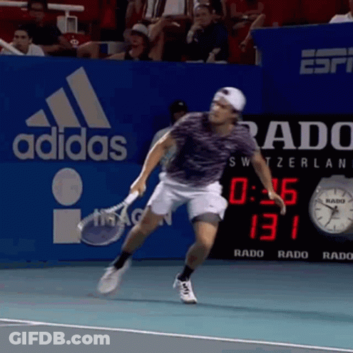 Man Playing Tennis In Front Of Adidas Sign GIF