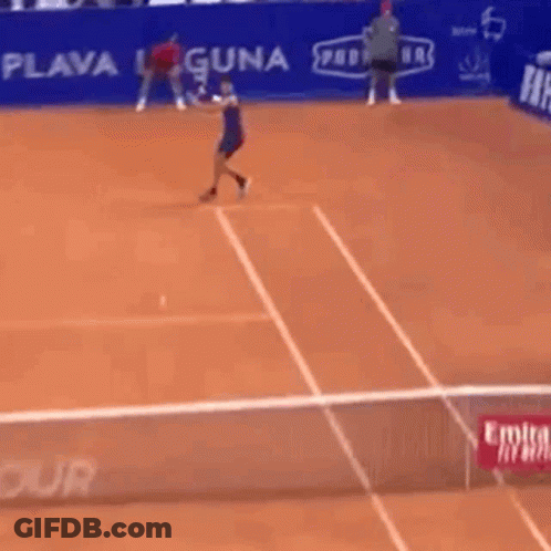 Man Playing Tennis In Front Of Hotel Banner GIF