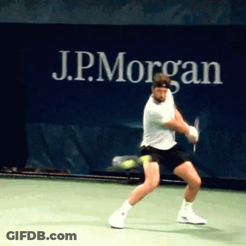Man Playing Tennis In Front Of JPMorgan Sign GIF