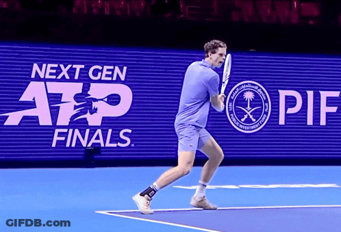 Man Playing Tennis In Front Of Next Gen Finals Sign GIF