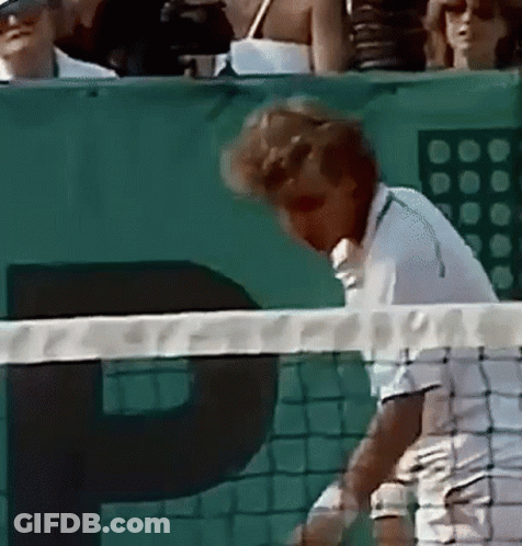 Man Playing Tennis In Front Of P Banner GIF