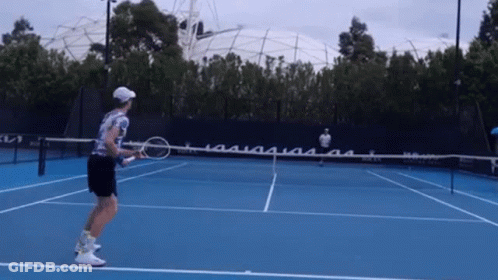 Man Playing Tennis On Blue Court At Australian Open GIF