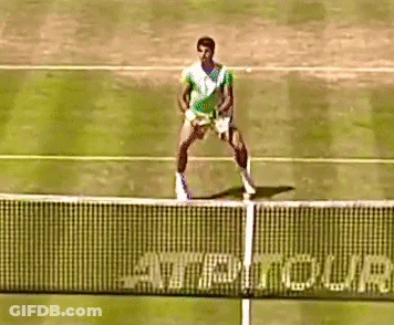 Man Playing Tennis On Court With AT&T Ad GIF