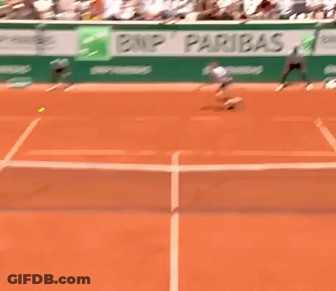 Man Playing Tennis With BNP Paribas Banner GIF