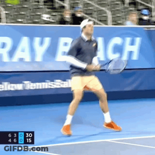 Man Playing Tennis With Mutua Madrilena Banner GIF