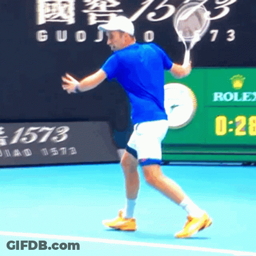 Man Playing Tennis With Rolex Ad GIF