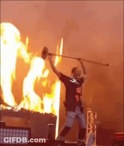 Man Playing Trumpet In Flaming Background GIF