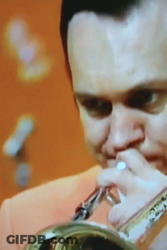 Man Playing Trumpet With Microphone GIF