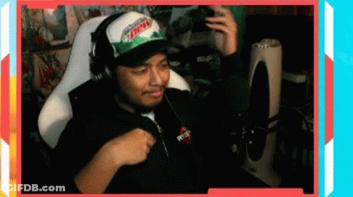 Man Playing Video Game In Headphones And Hat GIF