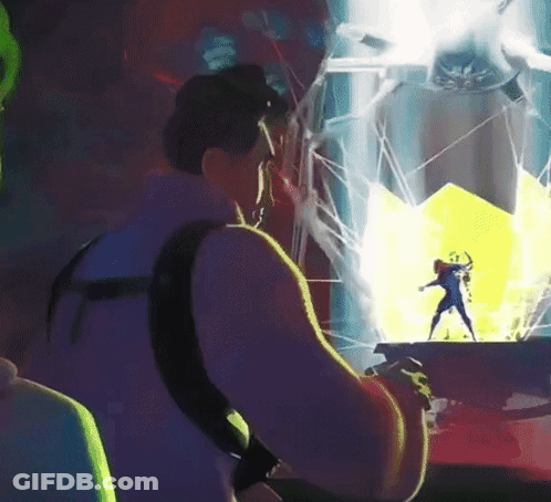 Man Playing Video Game With Superhero On Screen GIF