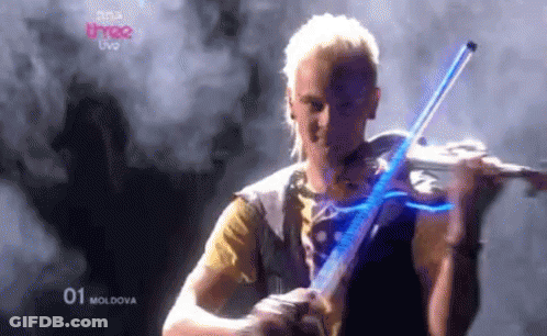 Man Playing Violin In Front Of BBC Three Live Screen GIF