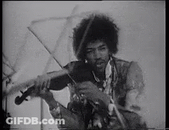 Man Playing Violin On Stage Black And White GIF