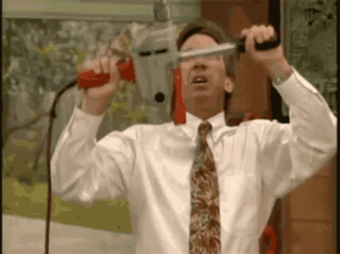 Man Plays With Drill Tool GIF