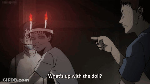 Man Pointing At Candle Head Doll GIF