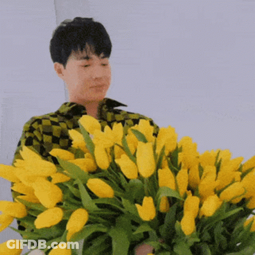 Man Pointing At Eye Chart With Letter E GIF