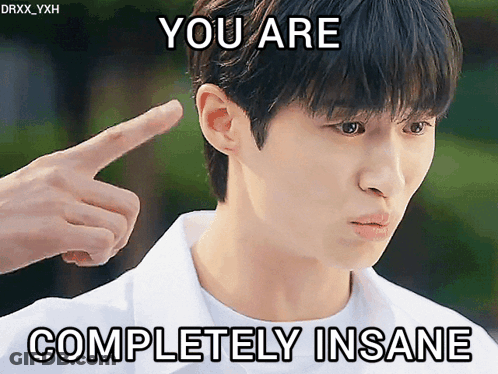 Man Pointing At Head Saying You Are Completely Insane GIF