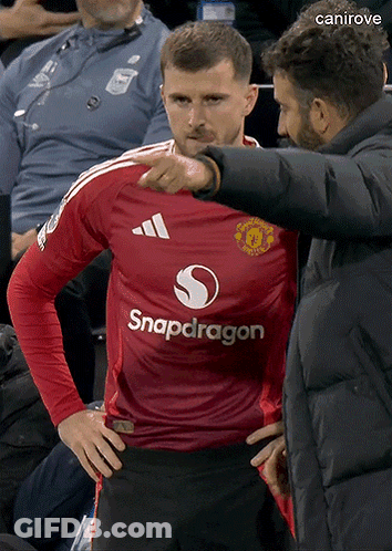 Man Pointing At Man In Red Snapdragon Jersey GIF