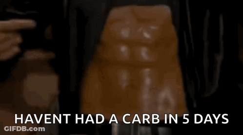 Man Pointing At Stomach Haven't Had A Carb In 5 Days GIF