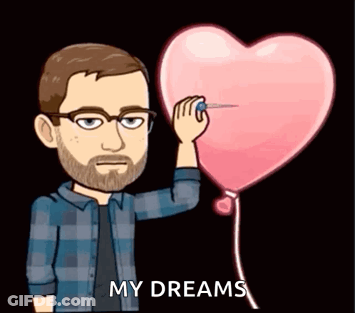 Man Pointing Dart At Heart Balloon Saying My Dreams GIF