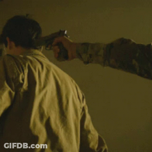 Man Pointing Gun At Another Man By Window GIF