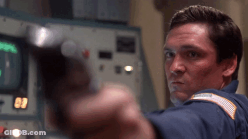 Man Pointing Gun At Camera With 09 GIF