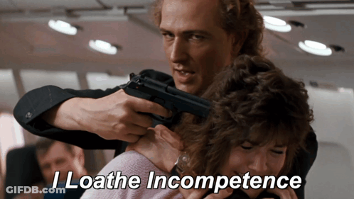 Man Pointing Gun At Woman Loathing Incompetence GIF