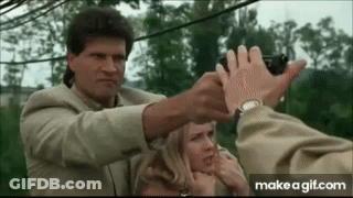 Man Pointing Gun At Woman GIF