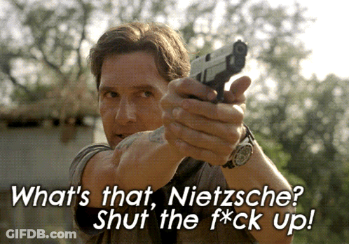 Man Pointing Gun Saying What's That Nietzsche Shut The F*ck Up GIF