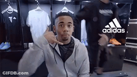 Man Pointing In Locker Room With Adidas Logo GIF