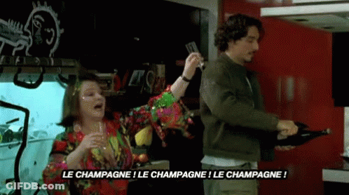Man Pouring Champagne As Woman Holds Glass GIF