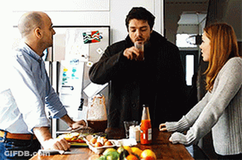 Man Pouring Drink Into Glass GIF