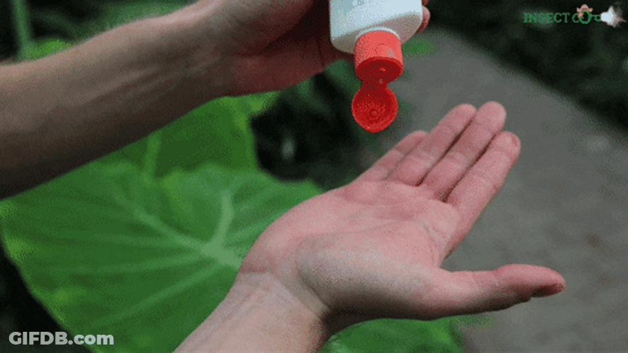 Man Pouring Insect Repellant Lotion GIF