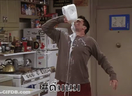 Man Pouring Milk Into Face GIF