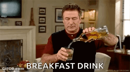 Man Pouring Whiskey Into Glass GIF
