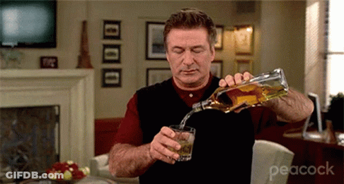 Man Pouring Whiskey Into Glass GIF