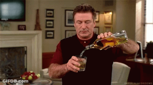 Man Pouring Whiskey Into Glass GIF