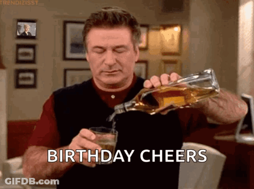 Man Pouring Whiskey Saying Birthday Cheers GIF