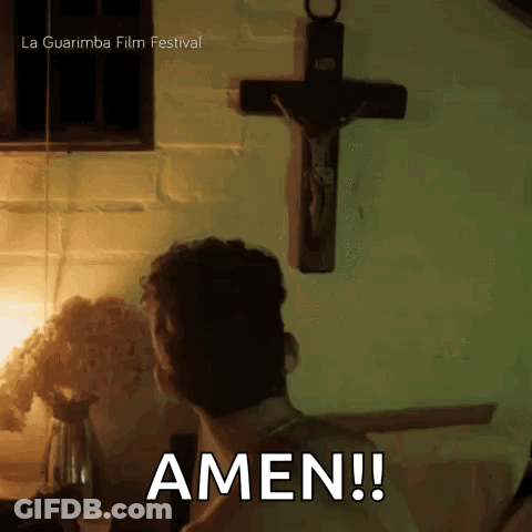 Man Praying In Front Of Cross With Amen On His Back GIF