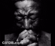 Man Praying With Folded Hands GIF