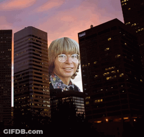 Man Projected On Building With Number 1666 GIF