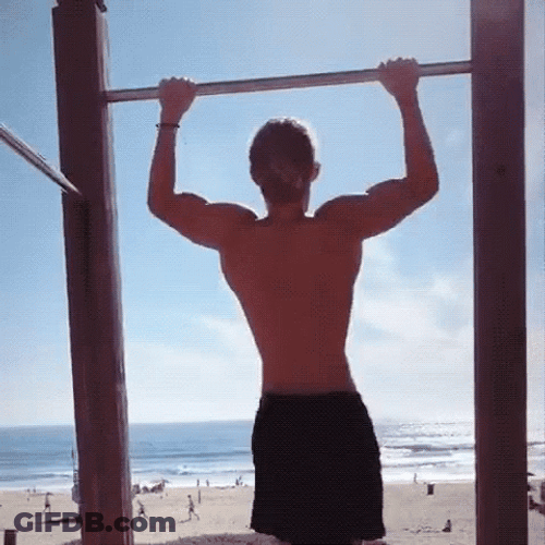 Man Pull Ups In Beach GIF