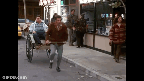 Man Pulling Horse-Drawn Carriage GIF