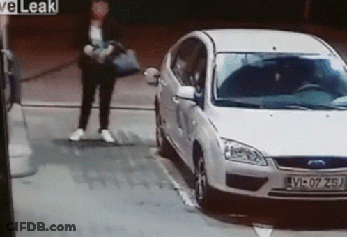 Man Pumping Gas At Gas Station GIF