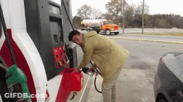 Man Pumping Gas Into Car GIF